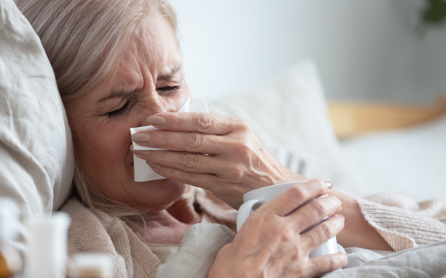 Sick-old-woman-suffering-from-Flu